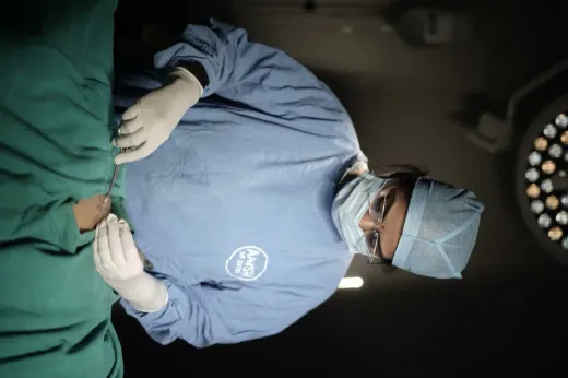 Dr. Shweta Agarwal operating under theatre lights at Aansh Hospital & IVF Center, Chandrapur